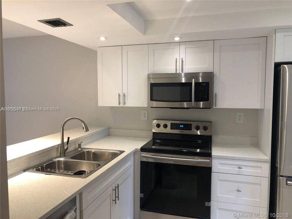 Photo of 905 Southridge Rd #104A, Delray Beach, FL 33444 (MLS # A11818296)