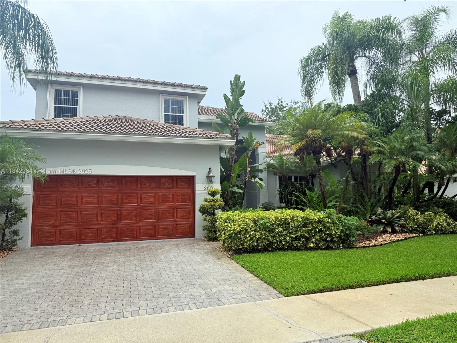 Best Value in Weston – Lowest $/SqFt! Don’t miss this spacious 4BR+Den, 4BA home with nearly 4,000 sq ft of living space in a gated community with pool & park. Flexible floor plan with oversized primary suite + den/5th BR on first floor, 3 large bedrooms upstairs. Remodeled kitchen & primary bath, walk-in closets, built-ins, gas appliances, solid mahogany doors, accordion shutters, and upgraded landscaping. Enjoy your private dream backyard with a newer heated spa, Trex deck, and screened patio — perfect for entertaining. 2 newer A/Cs (2010 & 2021), 8-year-old roof. Incredible opportunity for families looking for space, quality, and lifestyle at an unbeatable price!