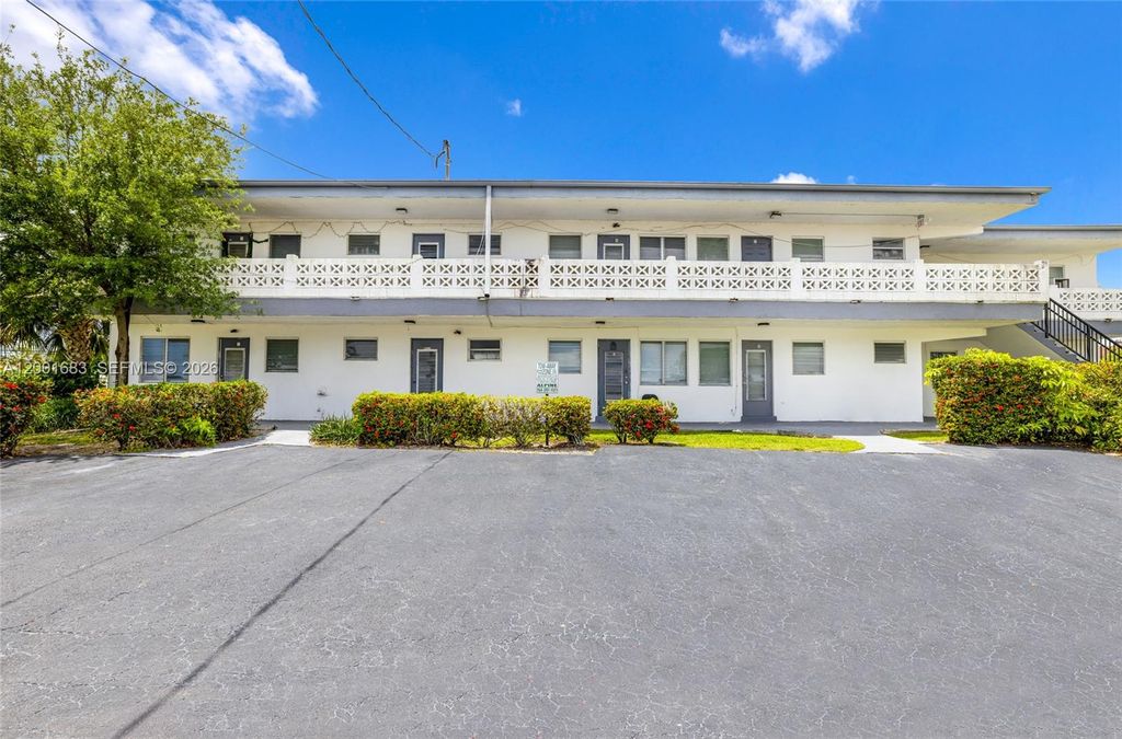 Photo of 1241 W River Dr #1-16, Margate, FL 33063 (MLS # A12001683)