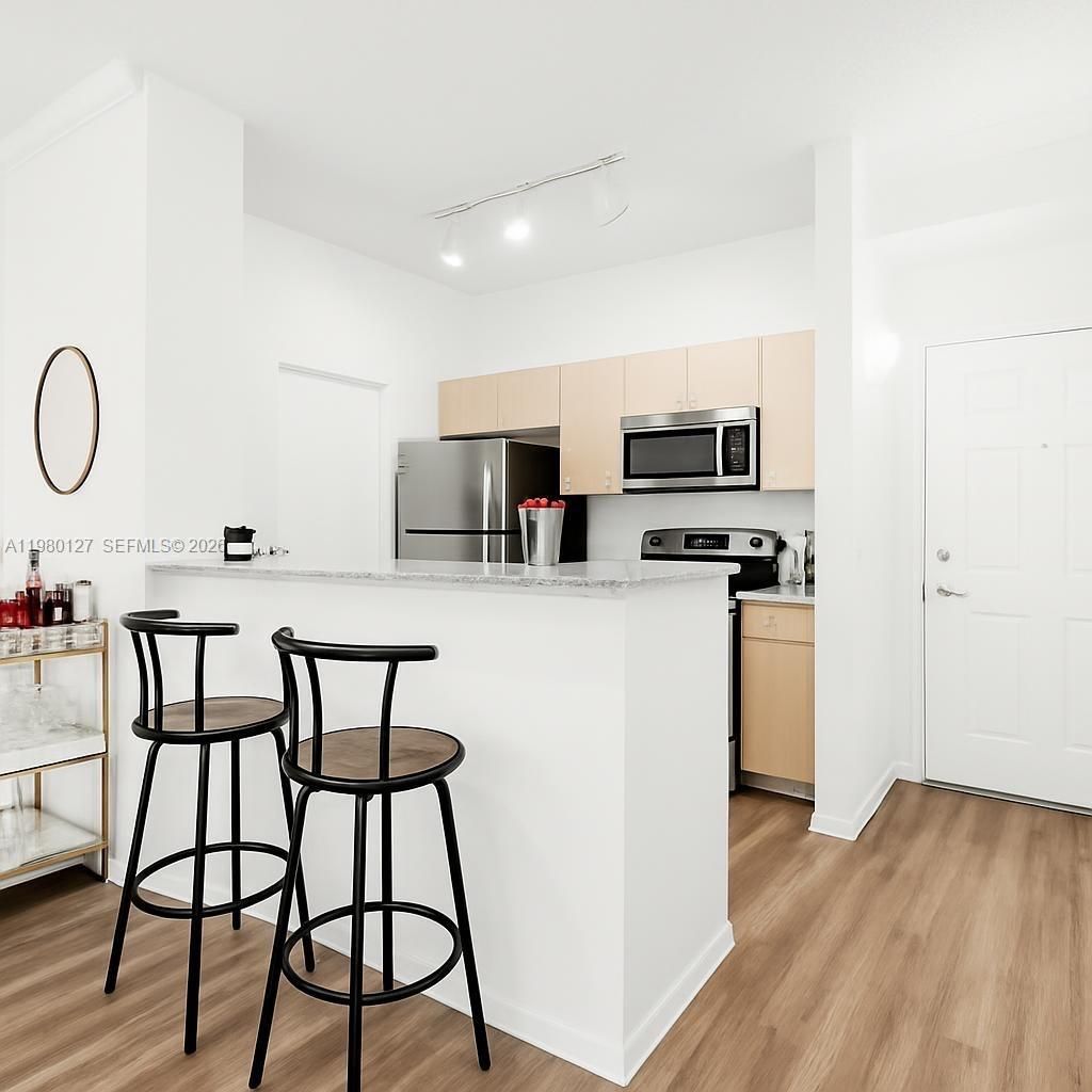 Photo of 1900 Van Buren St #112B, Hollywood, FL 33020 (MLS # A11980127)