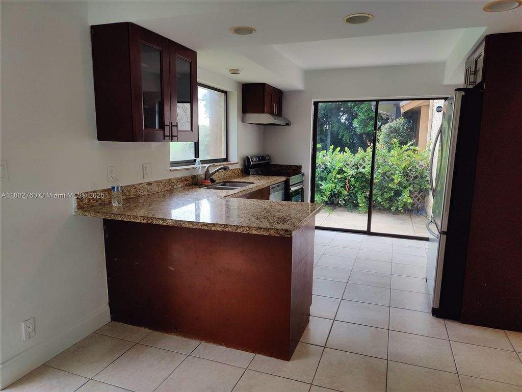 Photo of 181 Wimbledon Lake Dr #181, Plantation, FL 33324 (MLS # A11802760)