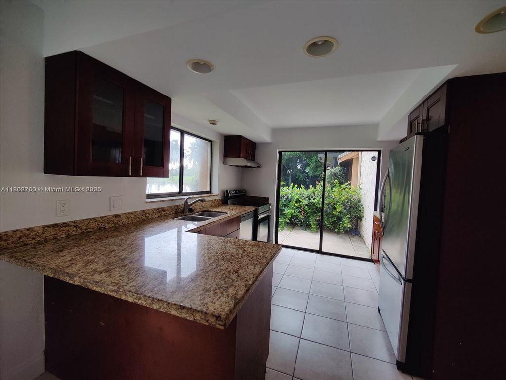 Photo of 181 Wimbledon Lake Dr #181, Plantation, FL 33324 (MLS # A11802760)