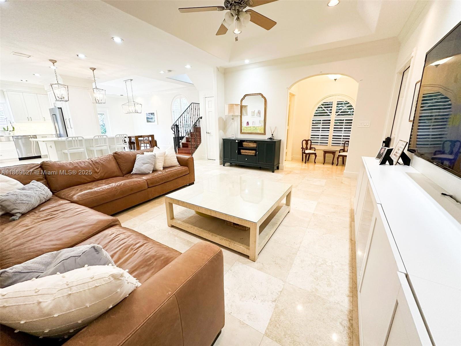 The thoughtful design and premium finishes make this completely remodeled 4br/2.5ba end unit a must see. The first floor consists of an open-concept living space & new gourmet kitchen featuring quartz countertops, marble backsplashes & an oversized island. These are complimented by stainless steel top-line appliances & solid maple white shaker cabinetry. Venture upstairs guided by the designer hand-forged iron railing to find the spacious master bedroom, walk-in California Closet & remodeled bathroom featuring expanded double shower and quartz countertops. The professionally landscaped, expanded terrace, remodeled guest bathroom, plantation shutters, high hat lighting, front-loading washer/dryer and a central vac system are just some of the other standout features of this gorgeous home.