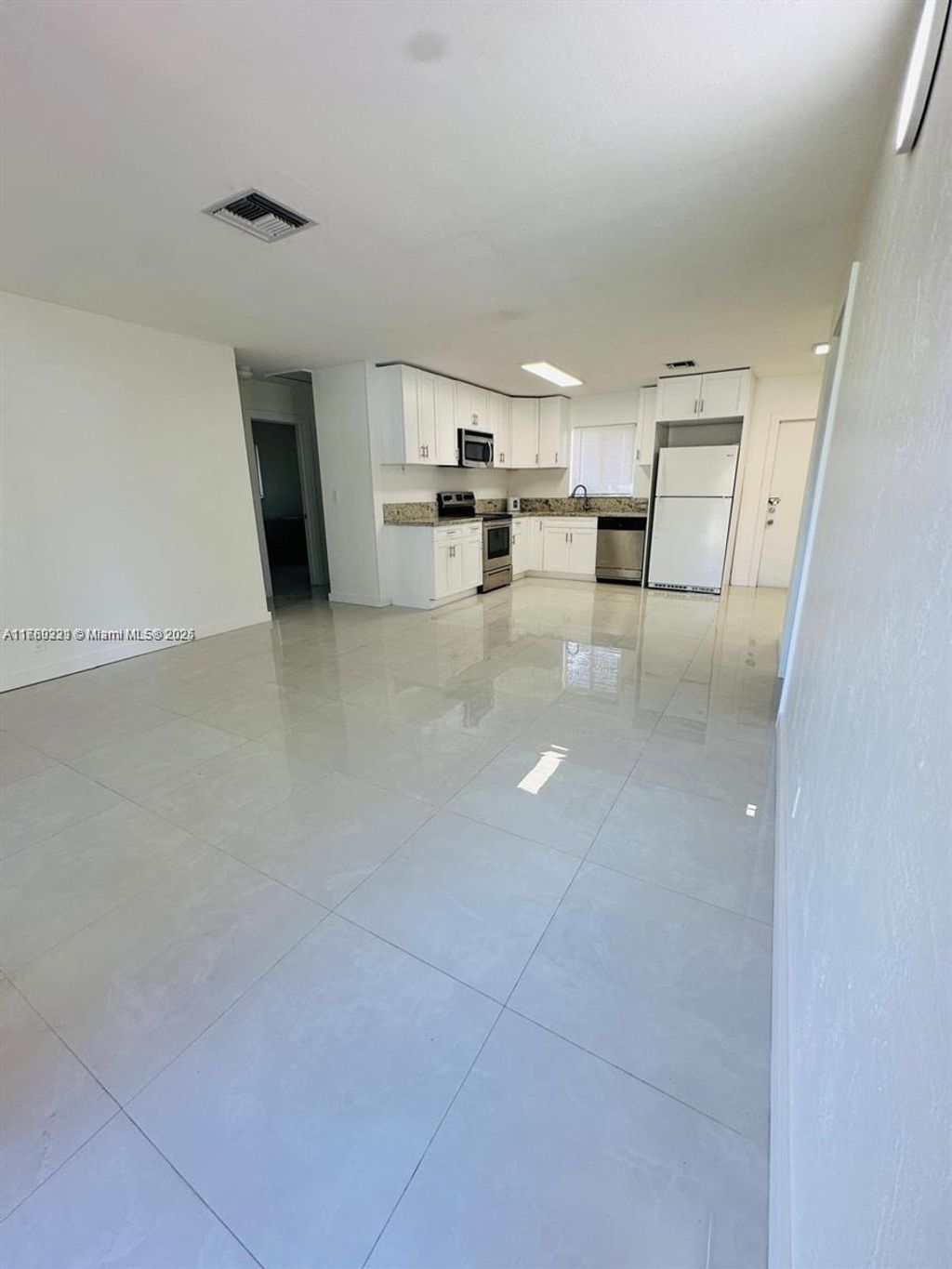 Photo of 2620 NW 14th Ct, Fort Lauderdale, FL 33311 (MLS # A11769331)