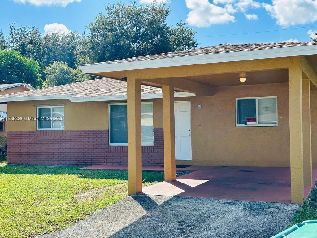 Photo of 2620 NW 14th Ct, Fort Lauderdale, FL 33311 (MLS # A11769331)