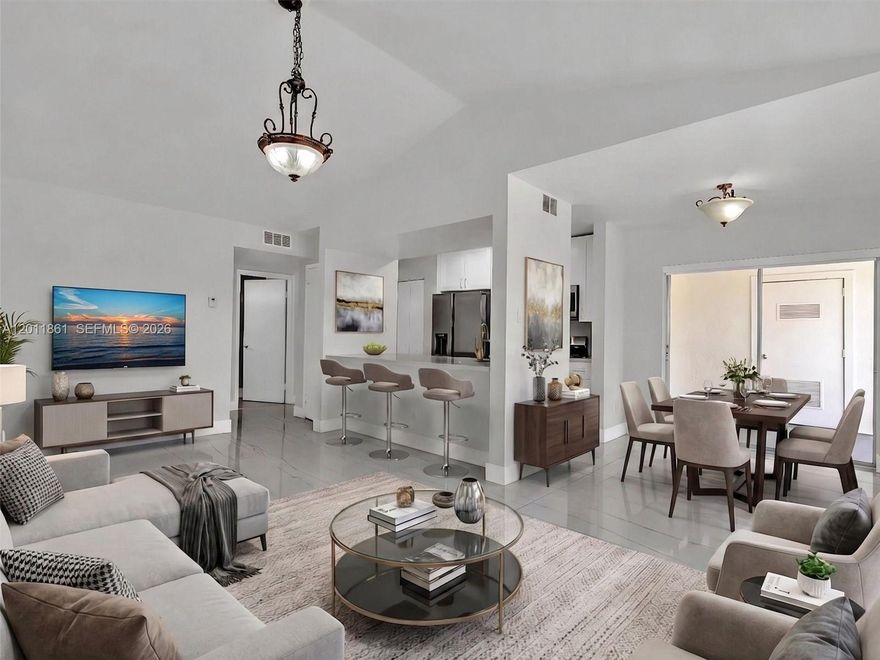 Completely updated and move-in ready 3rd-floor condo in the heart of Kendall! This beautifully renovated unit features a modern kitchen with quartz countertops, stainless steel appliances, and ample cabinetry. Both bathrooms have been fully updated with contemporary finishes, and porcelain tile floors run throughout for a clean, elegant look. Enjoy the convenience of an in-unit washer and dryer and unwind on your private balcony.

The community offers a resort-style lifestyle with a swimming pool, spa, beach-style lake with sand and volleyball net, and a scenic walking path around the lake. Residents also enjoy a fitness center currently being renovated for an enhanced experience.

Ideally located near shopping, dining, top-rated schools, and major highways, this property offers the perfect blend of comfort, style, and convenience. Ideal for end-users or investors seeking a turnkey opportunity in a highly desirable area.