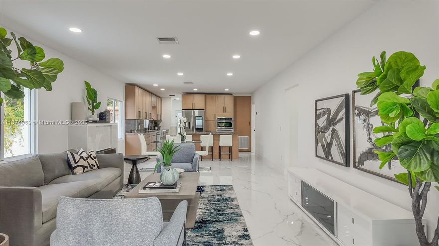 Fully modernized duplex designed for effortless ownership and strong returns in a prime growth corridor. Features new roof, impact windows/doors, Porcelanosa kitchens with smart stainless-steel appliances, and designer baths. Both units are move-in ready—ideal for rental income, Airbnb, or multigenerational living. Updated MEPs, central air with Google Nest, mini-splits in rear unit, new stucco, and a premium automated aluminum gate. Minutes from Midtown, and the Design District, this turnkey property offers flexibility, stability, and appreciation upside in one of Miami’s fastest-growing areas. Perfect for investors seeking cash flow or families wanting to stay close while enjoying modern comfort. The deal you can’t say no to—income-ready, modern, and minutes from it all. Tour it today!