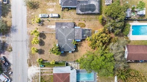 Photo of 1055 NW 143rd St, Miami, FL 33168 (MLS # A11977011)