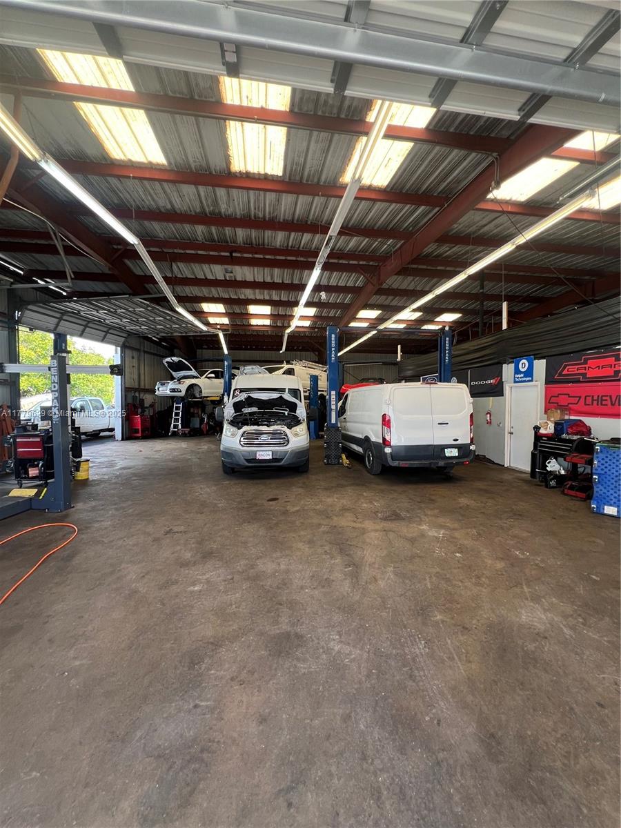 This Auto Repair Shop offers an exceptional opportunity for an auto mechanic business owner or investor. With 5040 square feet of prime commercial space, this property features a fully-equipped and operational auto repair shop, as well as a large fenced outdoor storage area for vehicles and parts. The shop is perfect for handling a variety of automotive repair services, including maintenance, diagnostics, bodywork, and more. 9 Lifts bays, office space, parts storage, and customer waiting area. High-visibility location, Fully-equipped workshop with state-of-the-art tools and equipment. Turnkey operation immediately with a ready-to-go facility. This is an ideal opportunity for a mechanic looking to expand their business seeking a profitable and well-established automotive repair facility.