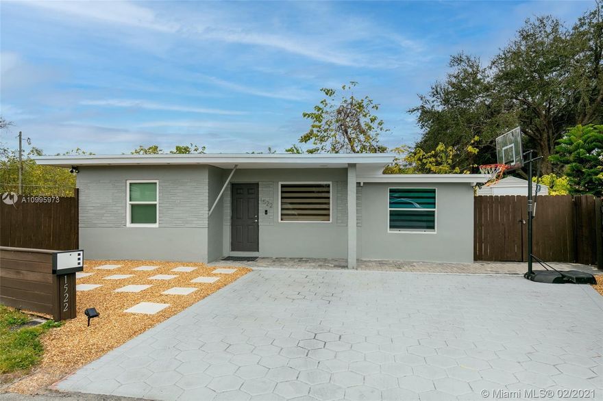 Modern oasis on the end of a quiet cul-de-sac located in central Hollywood. Minutes away from the Hard Rock Hotel & Casino, FLL airport, beaches & highways. Enjoy entertaining in the huge private backyard with avocado trees, fire pit, and plenty of room to install a pool. New wood fencing gives you the sense of being in your own private oasis with large concrete patio. All updates have been done within the last 2 years including stone countertops, stainless steel appliances, master bathroom/second bathroom, custom blinds, hurricane impact windows, tankless water heater, newer a/c, new roof and 8x8 Shed in backyard. Home has new light fixtures, ceiling fans, Nest thermostat, and home security system. HOME IS LARGER THAN TAX ROLL (1,250 sqft interior). No association and no restrictions.