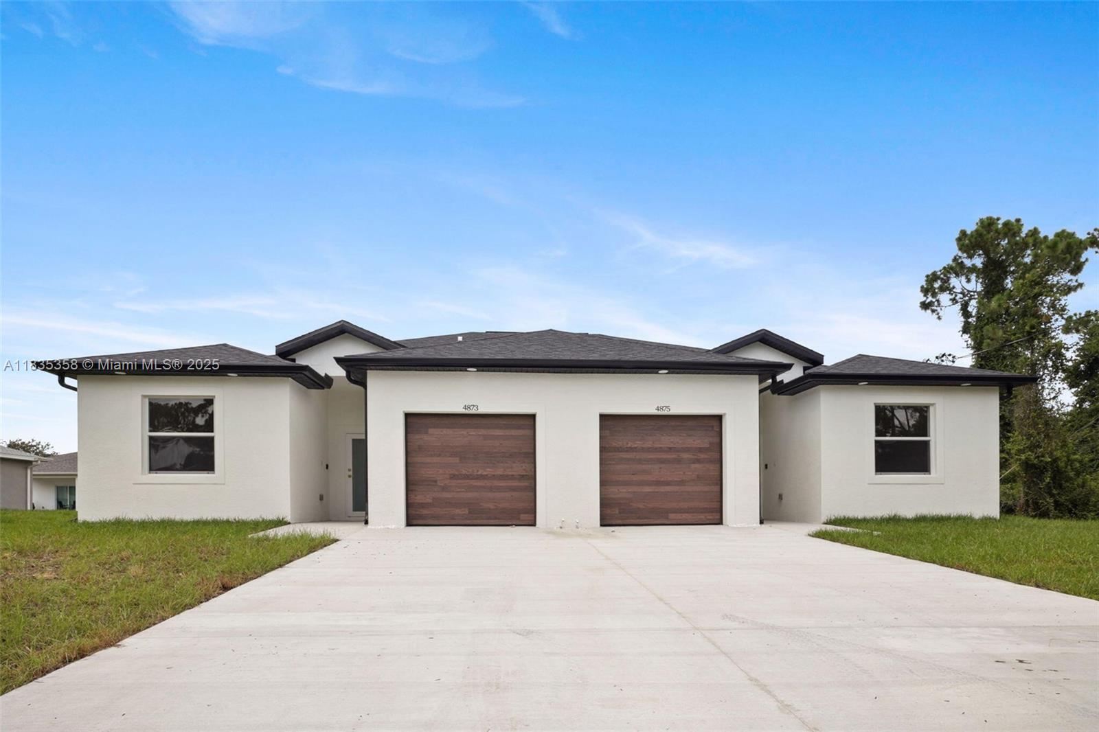 RARE OPPORTUNITY: Rarely does a duplex offer this level of finish, layout, and attention to detail – all on one of Lehigh Acres’ most well-kept, quiet streets near Fort Myers.
Inside: soaring tray ceilings, massive triple sliding doors (in both units), oak cabinets in kitchens and baths, timeless porcelain tile, and high-pressure Kohler shower systems with glass enclosures. Every bathroom includes elegant mirrors and vanity lighting.
Floorplans are split for privacy – lanais are positioned as far apart as possible with a natural landscaped buffer in between. Separate meters, driveways, laundry, and HVAC.
With this level of craftsmanship and location, this duplex is set to move quickly.