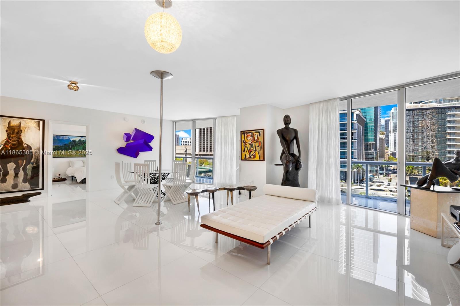 Unique and luxurious opportunity at Icon Brickell: two units combined into one extraordinary 1,596 SF residence with two independent entrances, offering flexibility for future use and the option to redivide the space according to each owner’s needs. This elegant home features an expansive open floor plan filled with natural light, two master bedrooms, and two private balconies with breathtaking views of Biscayne Bay, Miami’s skyline. Includes two assigned parking spaces for convenience and value. Residents enjoy Icon Brickell’s world-class amenities: stunning resort-style pool, luxurious spa, state-of-the-art fitness center, concierge, valet, fine dining, and the vibrant Brickell lifestyle—just steps from Brickell City Centre and Miami’s best restaurants. Two folios