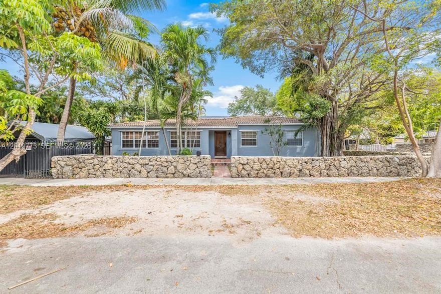 GREAT DEVELOPMENT opportunity in popular North Coconut Grove- Silicon Grove is here! As tech-finance giants move in, land stays scarce. Secure your piece of Miami’s most innovative, grooviest zip code. Positioned behind a fabulous signature coral rock wall with gated entry, this updated 3BR/2BA residence offers incredible potential for redevelopment or expansion. The private, gated parking and lush backyard provide an immediate sanctuary, while the high-elevation lot serves as the perfect canvas for your vision. Highlights for Investors, Builders, & End-Users: Prime North Grove Location: Surrounded by $4M+ new construction and meticulously renovated estates. Versatile Potential: Move in now, expand the existing footprint, or build new in a high-demand market. Unbeatable Proximity: Minutes to CocoWalk, top-rated schools, UM, Brickell, and MIA. A rare offering with significant upside in Miami’s most sought-after neighborhood. Don't miss your chance to own where innovation meets the tropical canopy. Cash only