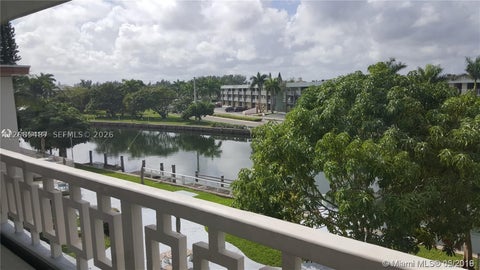 Photo of 467 Golden Isles Dr #306, Hallandale Beach, FL 33009 (MLS # A12085487)