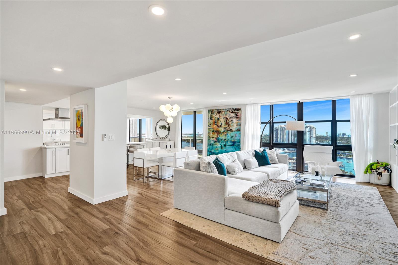 Skip the wait—step into rare 3BD/3BA designer perfection with panoramic water views on Belle Isle! Fully furnished & interior-designer styled, this 2,488 SF showpiece was gutted to the studs and rebuilt with luxury finishes, chef-inspired kitchen, and sweeping views. Kitchen offers expansive cabinetry, coffee & breakfast bars, wine fridge, and open flow to living/dining areas. Floor-to-ceiling impact windows + 3 balconies capture sunsets. Primary Suite w/seating area, walk-in closet, spa bath. Full-size laundry/storage, 2-zone AC, water filtration, porcelain plank floors. Iconic resort-style building renovated top-to-bottom (pool/hot tubs underway) with gym, conference/play/social rooms, doorman, valet. Steps to Sunset Harbour, Lincoln Road & The Standard. 2 covered parking.