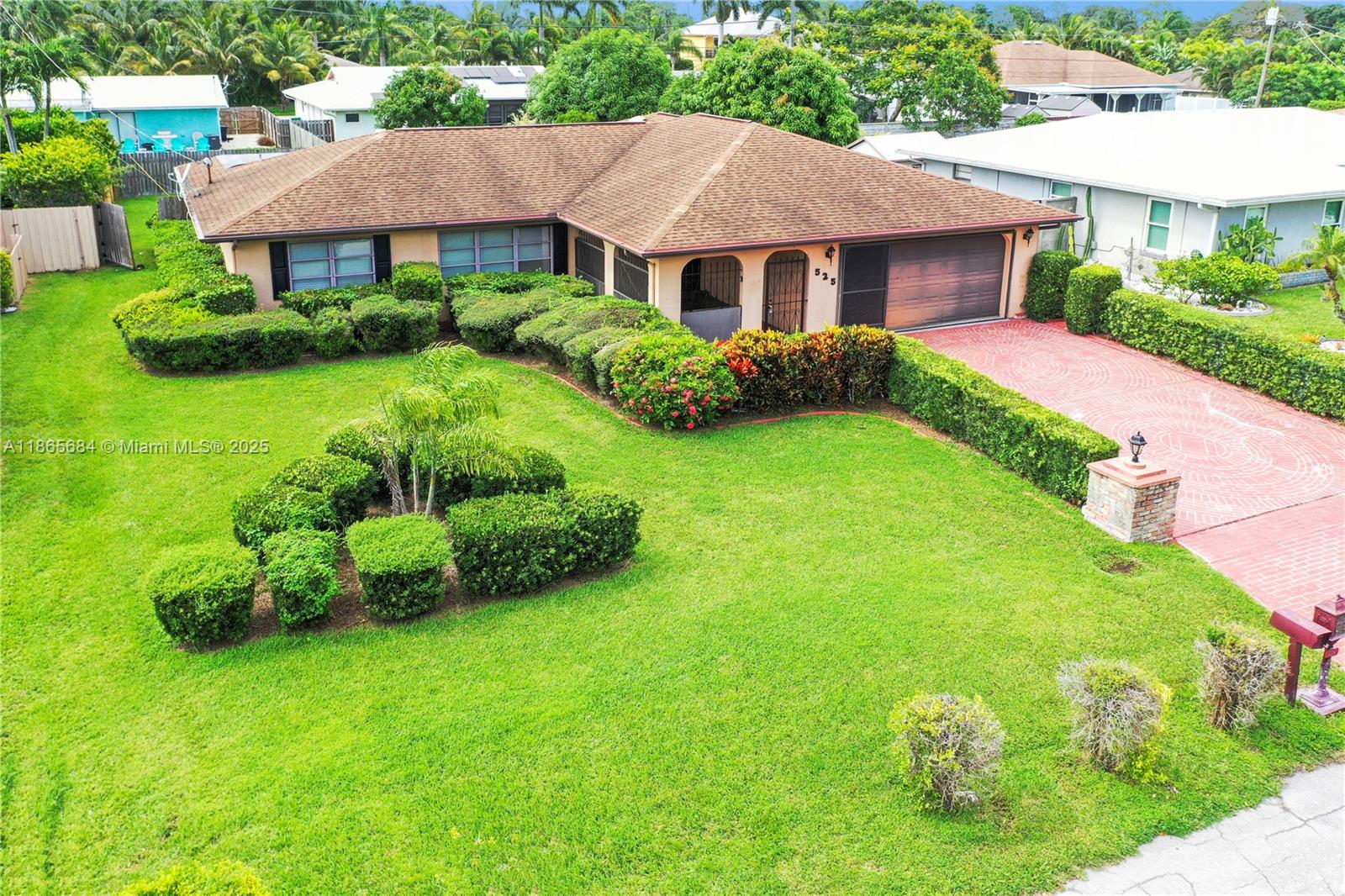 A true must-see! This beautiful 3-bedroom, 2.5-bathroom split floor plan will rent immediately. This home is over 2,100 sqft under air, with a large 2-car garage, custom workbench, and plenty of inside and outside storage. Brand-new remodeled bathrooms, freshly painted, ample closet space, and new vinyl plank flooring throughout. It comes fully equipped with a large utility room (washer/dryer and mop sink), an enclosed screened patio entrance, and an additional enclosed Florida room that could be used as a 4th bedroom, TV room, or office. A huge, fully fenced backyard is perfect for entertaining. The immaculate, landscaped front and rear yards give this home great curb appeal. This home features a great kitchen, living room, and dining room. The bedrooms are all generously sized.