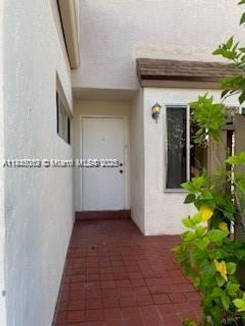 Photo of 879 NW 81st Way #4, Plantation, FL 33324 (MLS # A11845089)