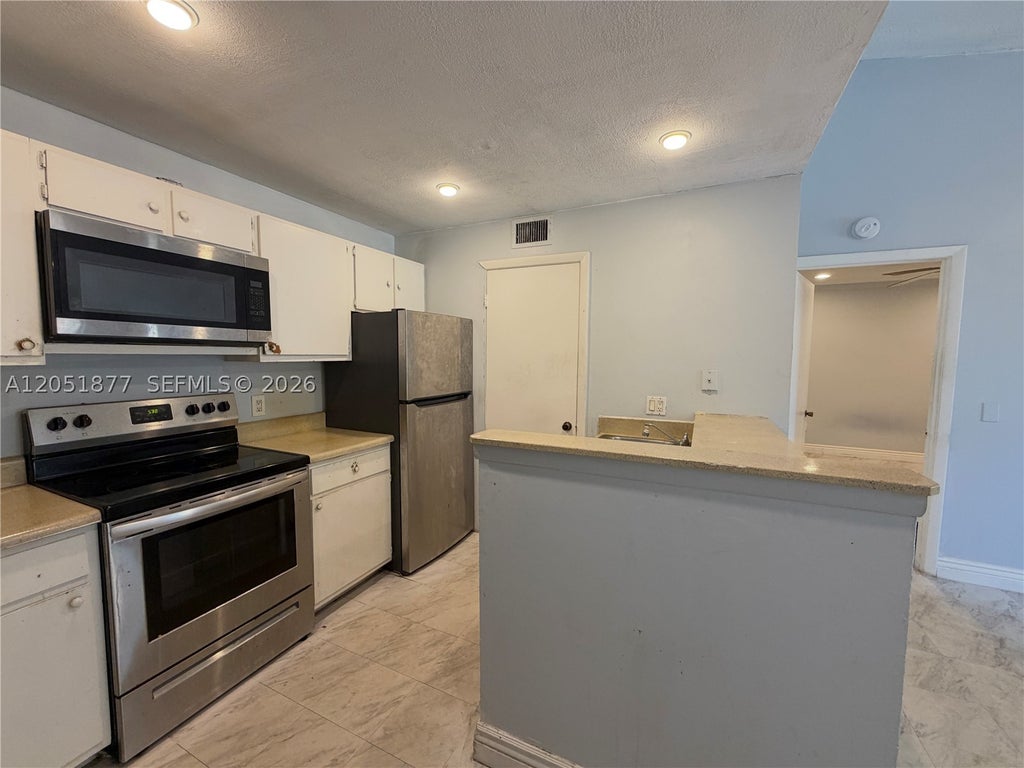 Photo of 4441 W Mcnab Rd #21, Pompano Beach, FL 33069 (MLS # A12051877)