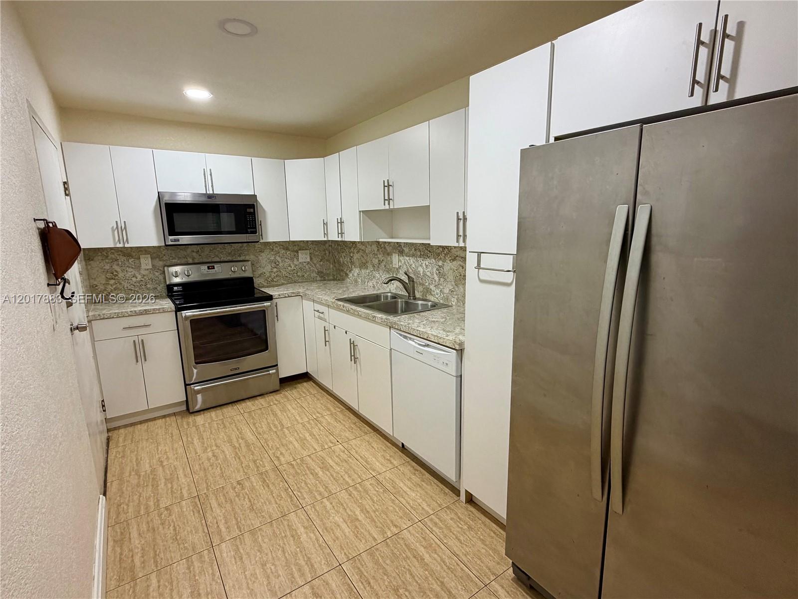SUNSET PALMS EAST CONDO - Residential