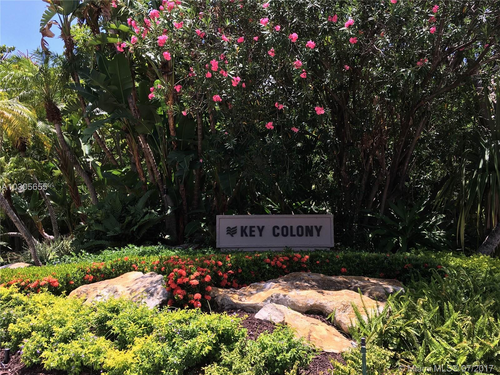 RARE TO FIND VERY SPACIOUS 1838 SF 2/2 SPLIT PLAN UNIT IN FABULOUS KEY COLONY (OCEAN SOUND) WITH RESORT STYLE AMENITIES IN A GATED COMPLEX WITH ACCESS TO BEACHES, TENNIS COURTS, POOLS, GYM, & MORE. ENJOY THE BEAUTIFUL TROPICAL LUSH GARDENS AND WATER VIEWS FROM LARGE BALCONY. EAT IN KITCHEN WITH GRANITE COUNTER TOPS, S/S APPLIANCES, WINE COOLER, PANTRY, AND LARGE LAUNDRY ROOM INSIDE UNIT. 2 ASSIGNED PARKING SPACES.