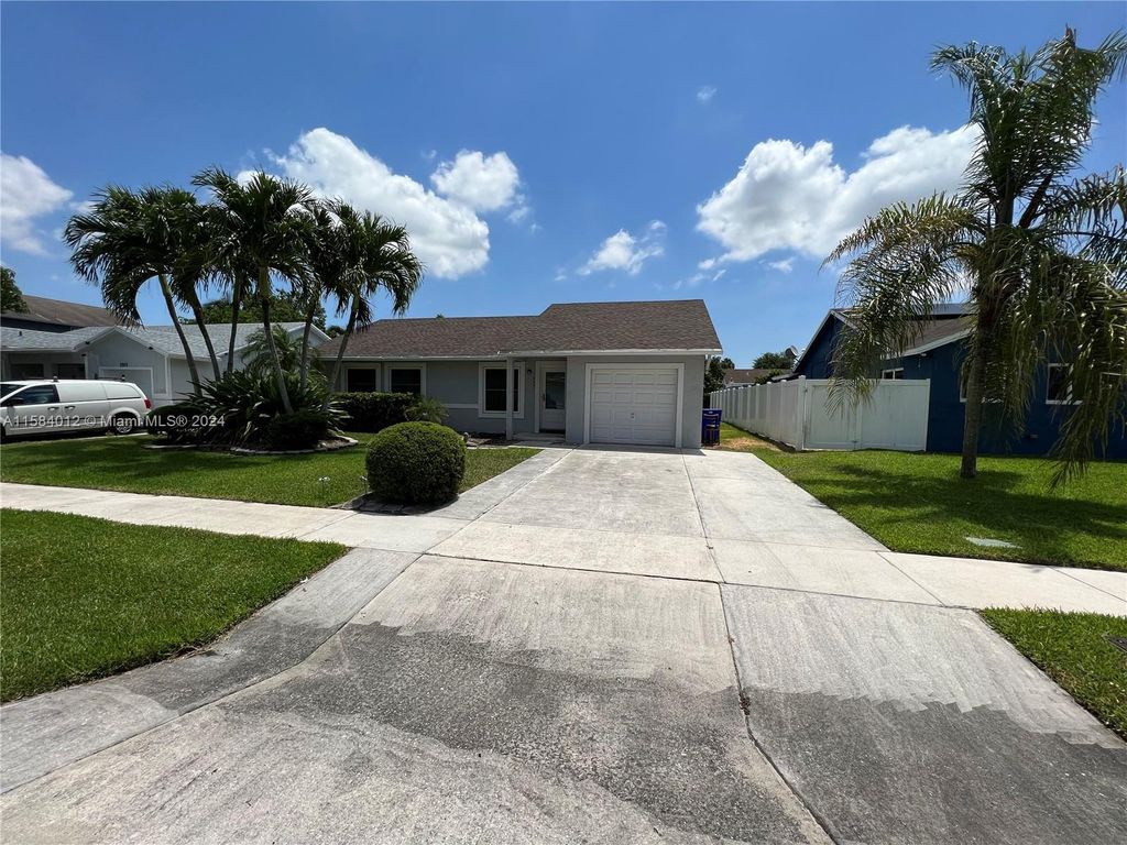 Photo of 2001 SW 87th Ave, North Lauderdale, FL 33068 (MLS # A11584012)