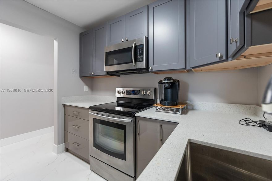 LOWEST HOA MAINTENANCE FEE $236/m CONTRIBUTES TO UP TO 10% CAP RATE, TO KEEP AS A CASH COW INVESTMENT AFTER 1 YEAR OF OWNERSHIP!  ALL AGES COMMUNITY!  LUXURIOUSLY RENOVATED 2BED/1BATH CORNER SOUTH FACING SUNNY UNIT! BRAND NEW KITCHEN WITH SPARKLING BRIGHT QUARTZ COUNTERTOPS, DEEP STAINLESS STEEL SINK, BRAND-NEW S/S APPLIANCES . . . BATHROOM WAS GUTTED TO BRAND NEW SPOTLESS MODERN LUSTER!   NEW RECESSED LIGHTING, NEW FLOORING, NEW WATER HEATER.  EXTENDED SCREENED BALCONY WITH STORAGE.  NUMEROUS AMENITIES INCLUDE CLUBHOUSE, GYM, REFRESHING POOLS, TENNIS, BASKETBALL, CHILD PALY AREA, PICNIC, JACUZZI, 2 ADJACENT PARKS … CLOSE TO UNIVERSITY DRIVE’S ENDLESS ARRAY OF FINE DINING & SHOPPING, BANKS, EZ TO MAJOR HIGHWAYS & SO MUCH MORE !