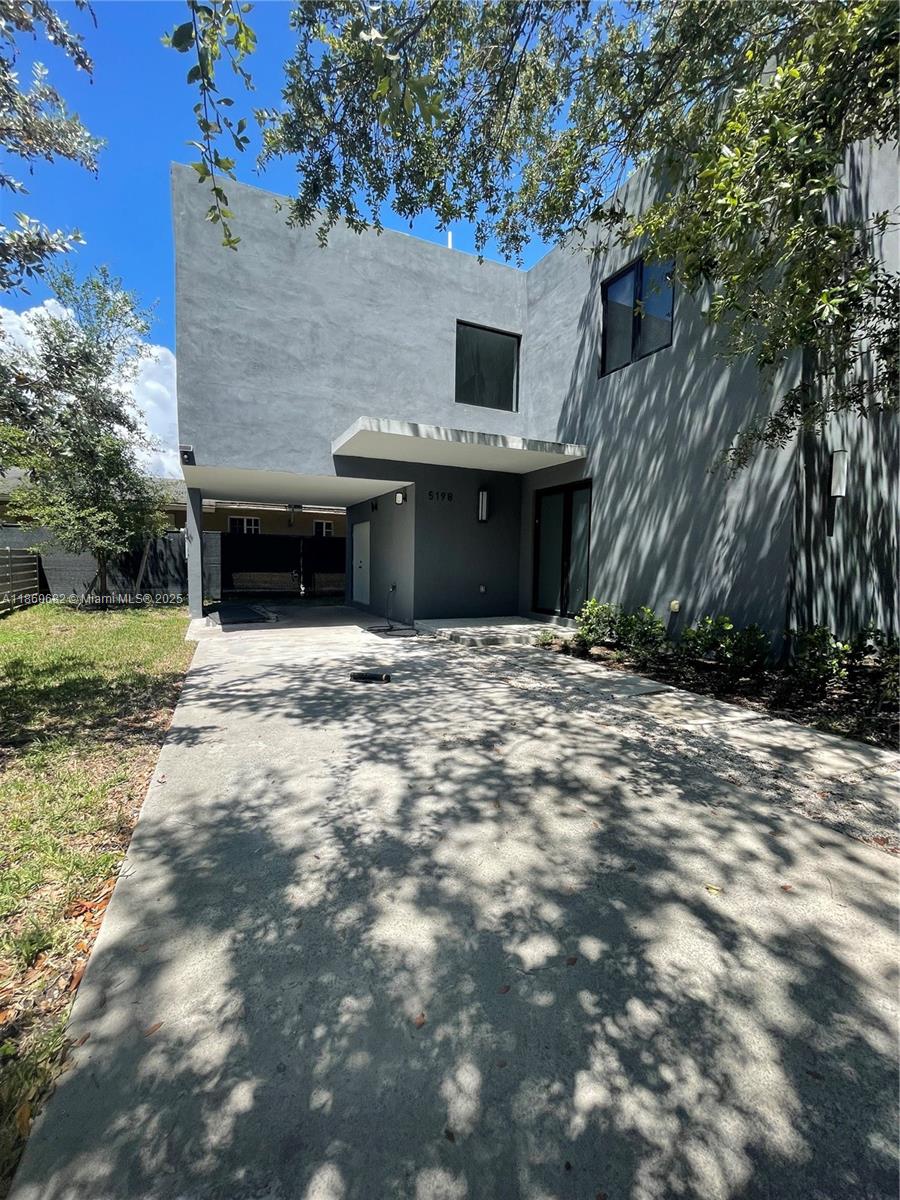 Experience modern living in this stunning new construction just minutes from the Design District. This spacious 3-bedroom, 2.5-bath home features an open layout, stainless steel appliances, impact windows, wood floors, and in-unit washer & dryer. Enjoy great natural light and a beautiful outdoor space — perfect for relaxing or entertaining. Move-in ready!