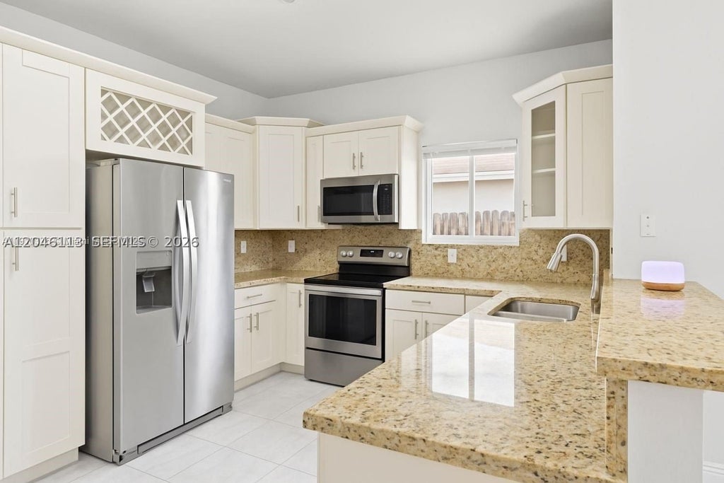 Photo of 1110 NE 1st Ave #1110, Fort Lauderdale, FL 33304 (MLS # A12046113)