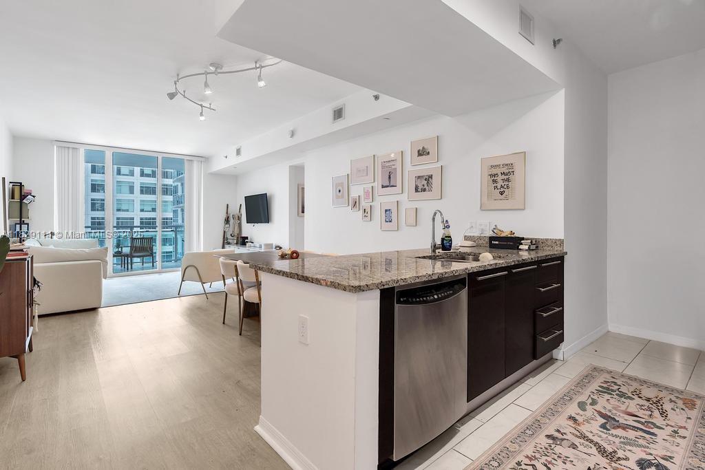 Luxury and convenience right in the heart of Brickell. Just steps away from the city's premier shopping and dining experiences, this condo is perfectly poised for a professional or couple. This is the largest one bedroom and one bathroom line at The Plaza and features a large walk-in closet, washer/dryer, counter top island and offers views of the garden and pool. Enjoy meals in the dining space, and unwind in the open living room with window treatments, all within a newly upgraded space. This home is also a short drive to both the beach or airport. Whether you prefer it furnished or unfurnished, this property is ready to welcome you home starting August 15th. Embrace a lifestyle of elegance and convenience in a location that truly has it all. Available fully furnished for $3500.00 a month