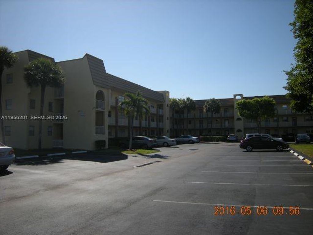 Photo of 8325 Sunrise Lakes Blvd #112, Sunrise, FL 33322 (MLS # A11956201)