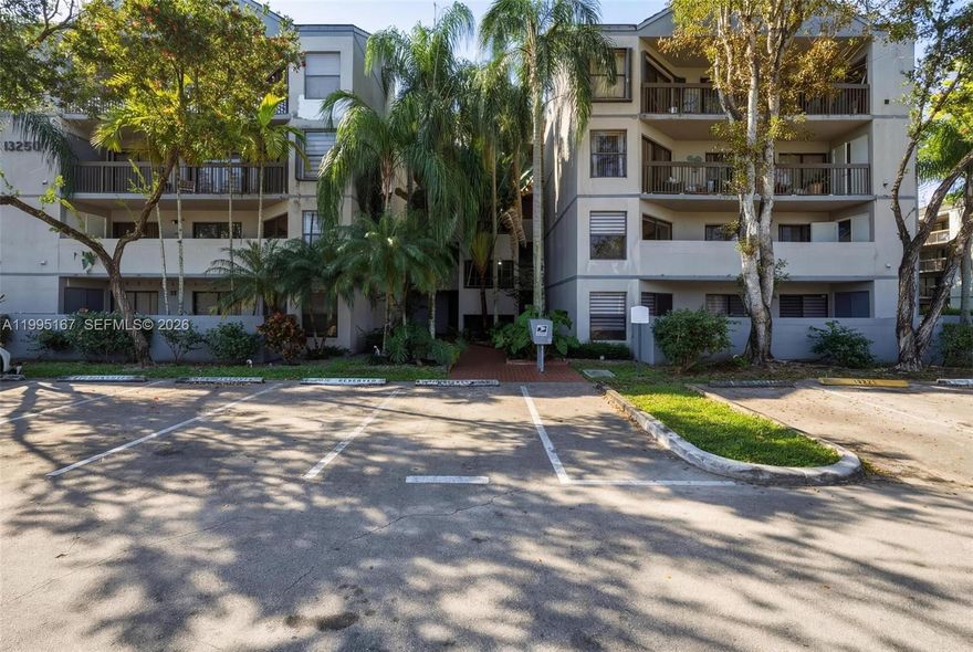 Discover comfort, style, and convenience in this beautifully updated 2-bedroom, 2-bathroom residence located in the highly desirable Calusa Club Village. Nestled within a charming two-story building, this spacious unit located on the first floor and large balcony ! features a bright, open-concept layout that seamlessly connects the kitchen, living, and dining areas—perfect for both everyday living and entertaining.

Designed with both elegance and practicality in mind, the home is fully equipped with accordion shutters for peace of mind during storm season, while custom Zebra shades enhance every window and sliding door with a modern touch. The expansive primary suite offers a private retreat, complete with an ensuite bathroom and a generous walk-in closet.

Natural light pours throughout the home, highlighting its functional design and inviting atmosphere. Residents enjoy access to resort-style amenities, including three sparkling pools, tennis courts, and scenic walking trails.

Ideally situated just minutes from the Florida Turnpike, as well as premier shopping, dining, and top-rated schools, this property offers unmatched convenience. Whether you're searching for your next home or a smart investment opportunity, this is a standout choice.

Schedule your private showing today—this one won’t last! Call the listing Agent.