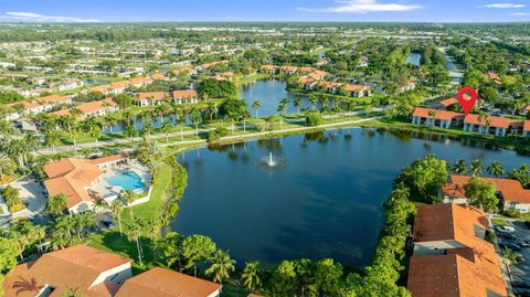 Photo of 1540 Windorah Way #D, West Palm Beach, FL 33411 (MLS # A11850730)