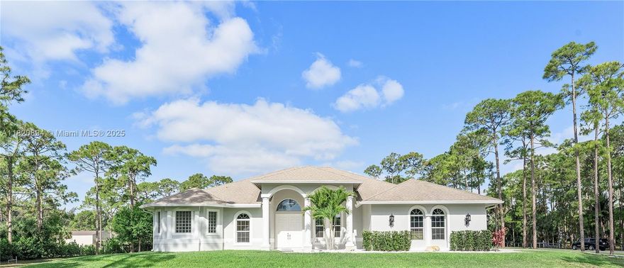 Welcome home to this newer construction, equestrian estate with 4,140 sq ft of living space on more than 2.5 acres of land in a sought-after, horse-friendly community. Main house 4Bed/3Bath plus office. Detached guest house with 1Bed/1Bath, plus den & full kitchen. The layout is designed for both everyday comfort & entertaining, with high ceilings, open-concept design, & lots of natural light. Enjoy the saltwater pool & hot tub. Including a 2-car garage & hurricane impact windows throughout. Incredible upgrade $100K+ solar panel system reducing energy bills. Whether you are an equestrian enthusiast looking to build stables for horses or wanting to enjoy more space in peaceful luxury, this move-in ready estate has it all and is just minutes from local equestrian parks, shopping, & schools.