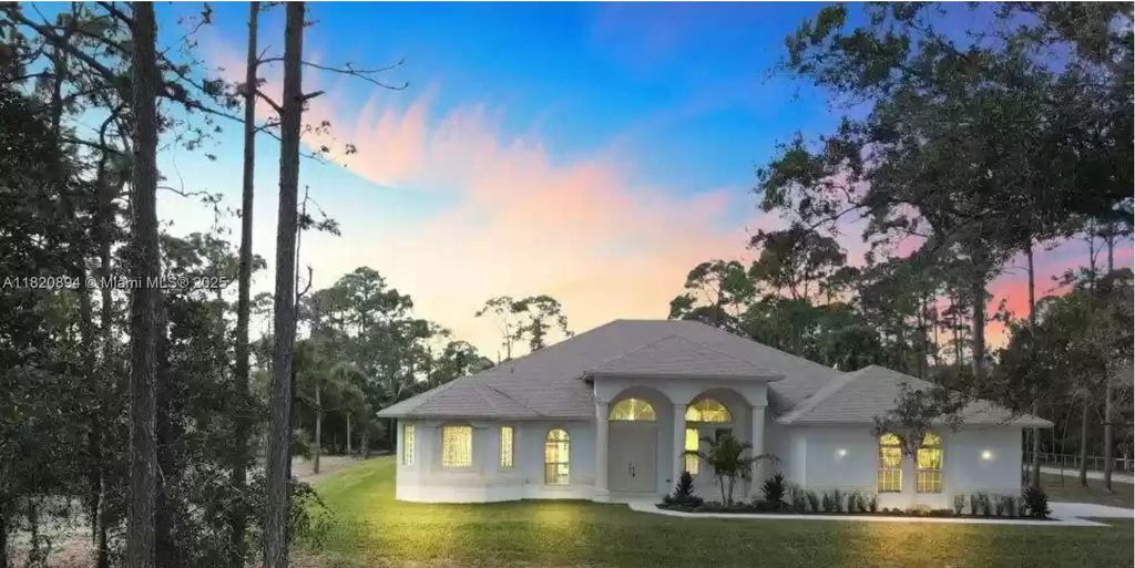 Photo of 17038 N 61st Pl N, Loxahatchee, FL 33470 (MLS # A11820894)