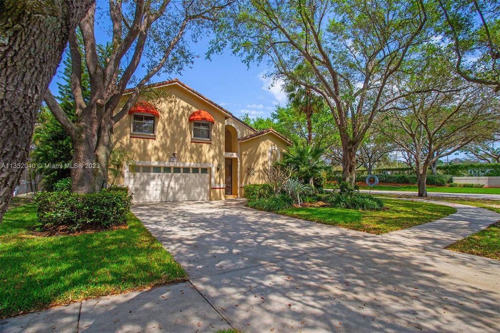 Photo of 5701 NW 60th Pl, Parkland, FL 33067 (MLS # A11352040)