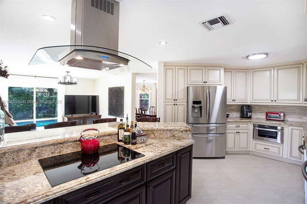 Photo of 5701 NW 60th Pl, Parkland, FL 33067 (MLS # A11352040)