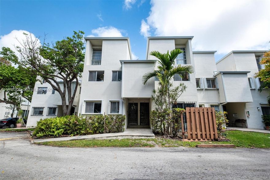 Rare townhome-style condo in the heart of Shenandoah, one of Miami's most sought-after neighborhoods. This 2BD/1.5BA, 970 sqft gem spans two stories with tile floors throughout, an open living/dining layout, stainless steel appliances, breakfast bar, and a fully permitted den addition (2025) with impact windows and lush treetop views. Master suite features a private balcony overlooking the garden and pool area. Updated electrical panel (2021), AC (2020), and new roof over den and balcony (2025). One of the only units in gated La Arboleda with an in-unit W/D. Community pool. Low $400/mo HOA. Minutes to Brickell, Coconut Grove, Coral Gables, Downtown Miami, and Metrorail.