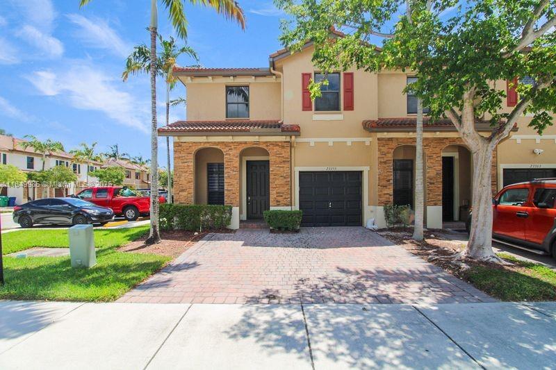 Beautiful corner townhouse featuring 3 beds, 2.5 baths, freshly painted interior, painted cabinets, ceramic tile throughout the first floor, and wood stairs. Stainless steel appliances, full-size washer & dryer, and storage space included. Spacious back patio, resort-style amenities, and quarterly community events. Conveniently located near shopping, dining, and essentials.