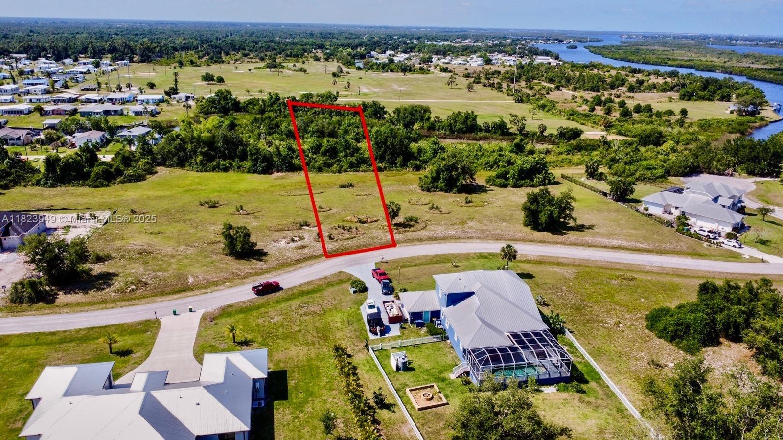 In the serene and growing community of Peace River Shores. This generously parcel offers ample space to build your dream home, with the flexibility to design a custom layout that suits your lifestyle. Surrounded by natural beauty, the lot is conveniently located near the Peace River, providing easy access to boating, fishing, and outdoor recreation. Just minutes from downtown Punta Gorda’s charming shops, dining, and entertainment, this location perfectly balances tranquility and convenience. HOA allowing for greater freedom in development. Utilities are nearby, simplifying the building process. Ideal for buyers seeking a peaceful retreat or investors looking to capitalize on Punta Gorda’s expanding real estate market. Don’t miss out on this prime piece of Florida paradise.