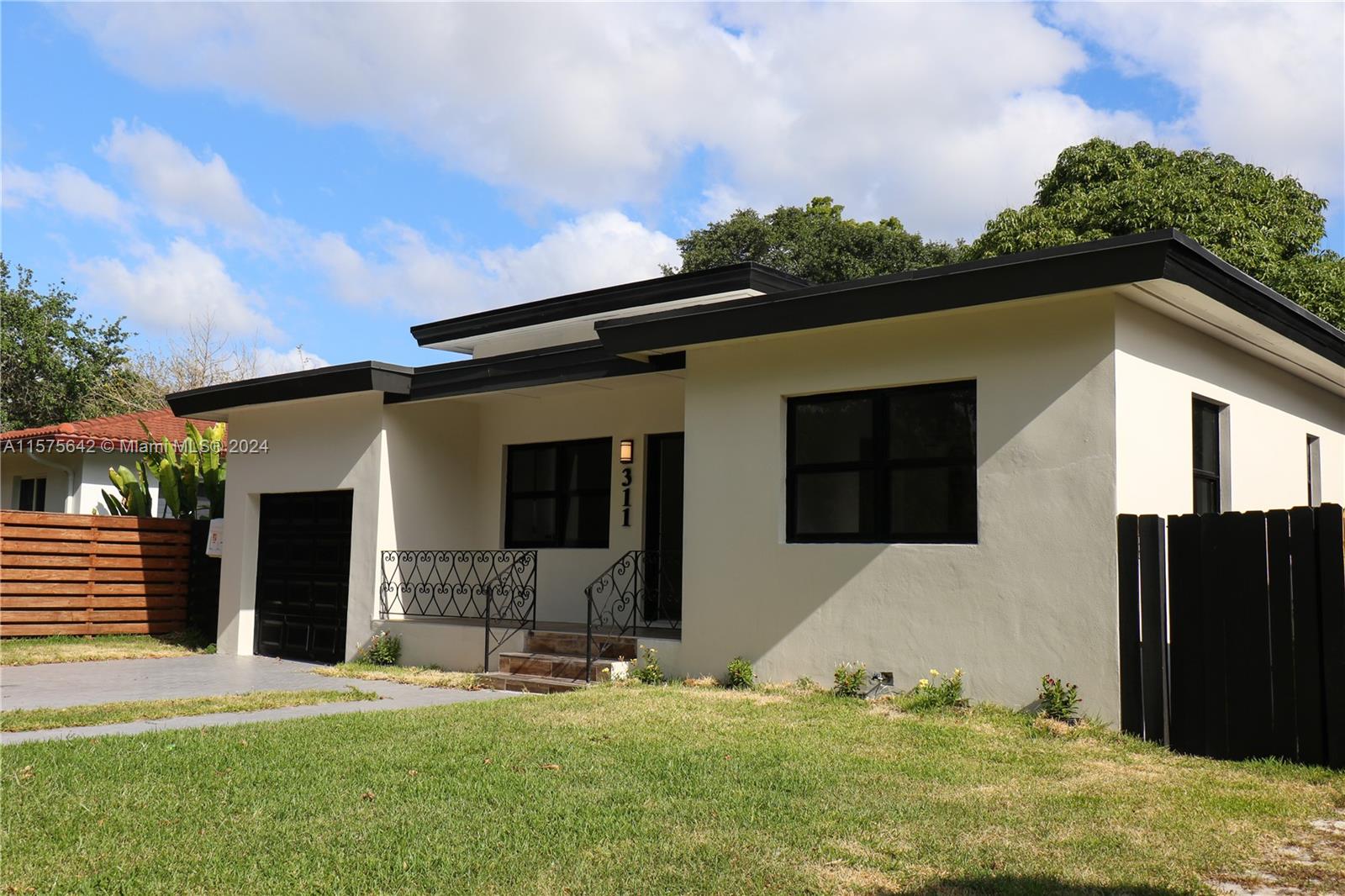 311 Ne 90th St, El Portal, Miami-Dade County, Florida - 3 Bedrooms  
3 Bathrooms - 