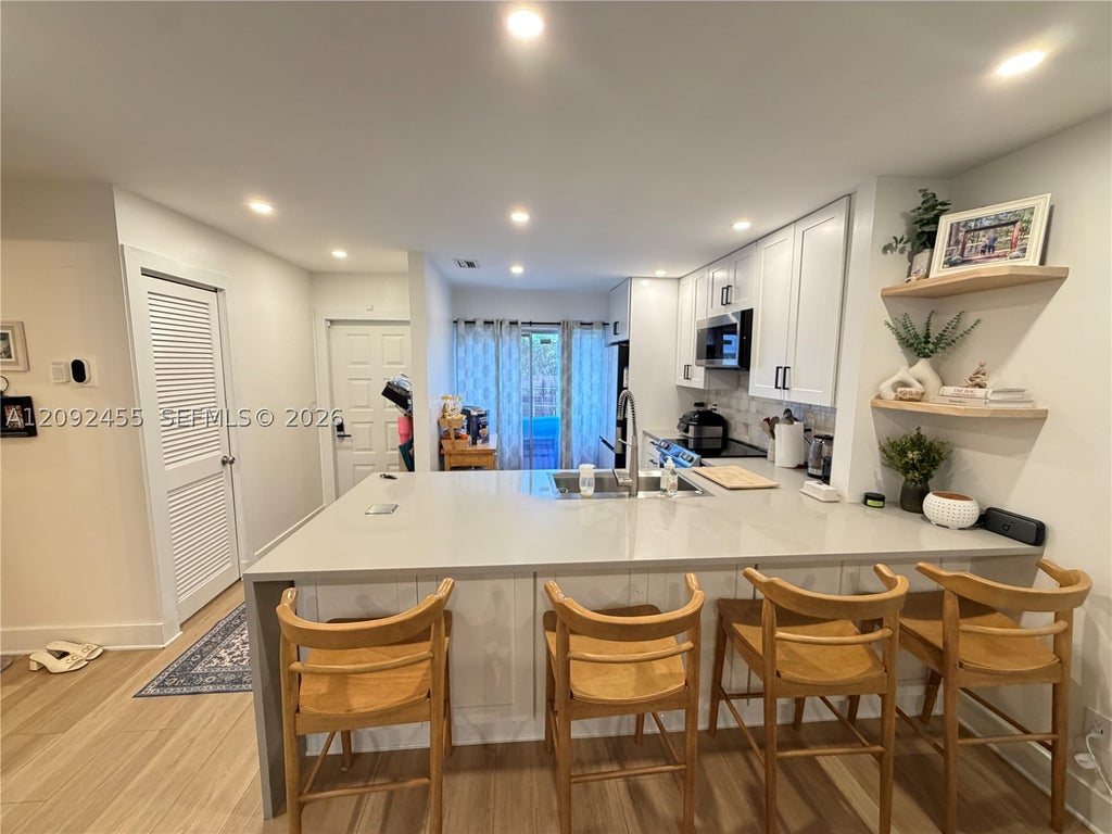 Photo of 844 Banks Rd, Coconut Creek, FL 33063 (MLS # A12092455)