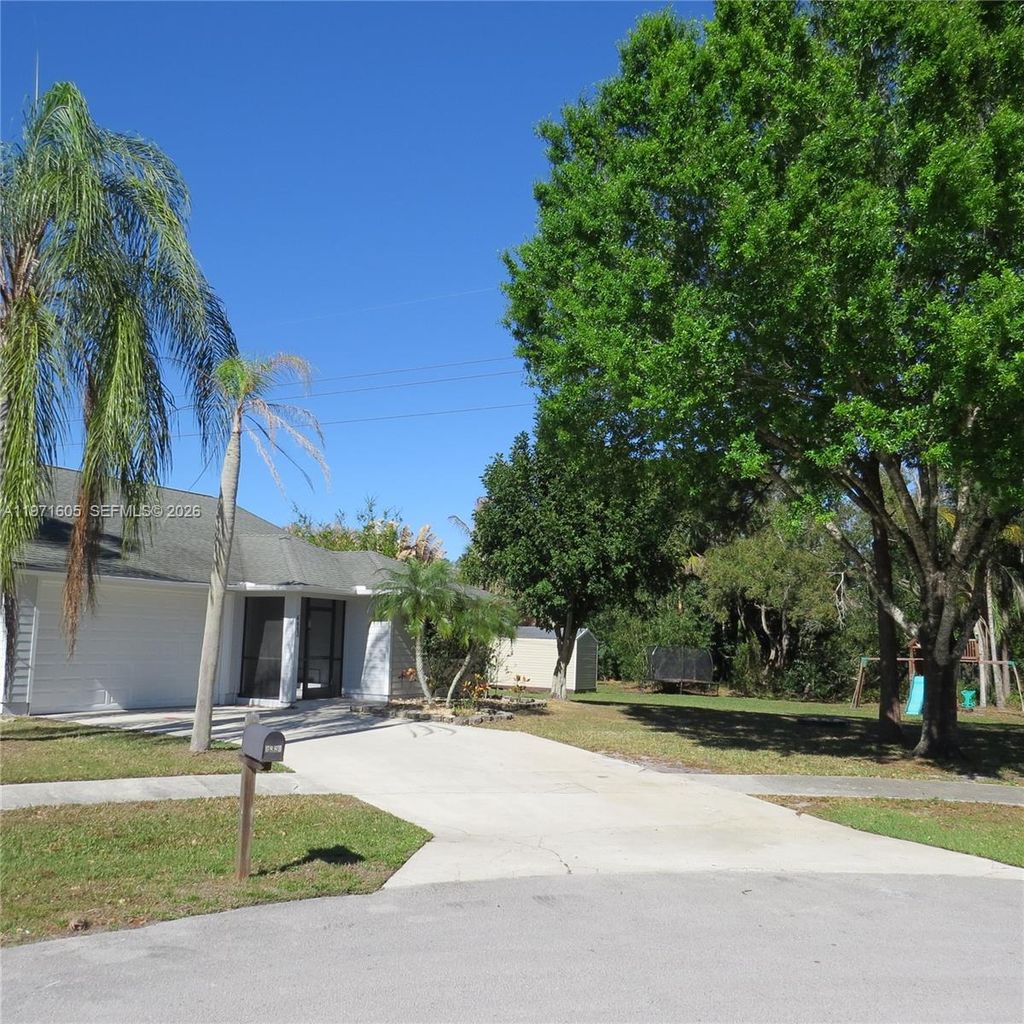 Photo of 6883 SE Raintree Ave, Stuart, FL 34997 (MLS # A11971605)