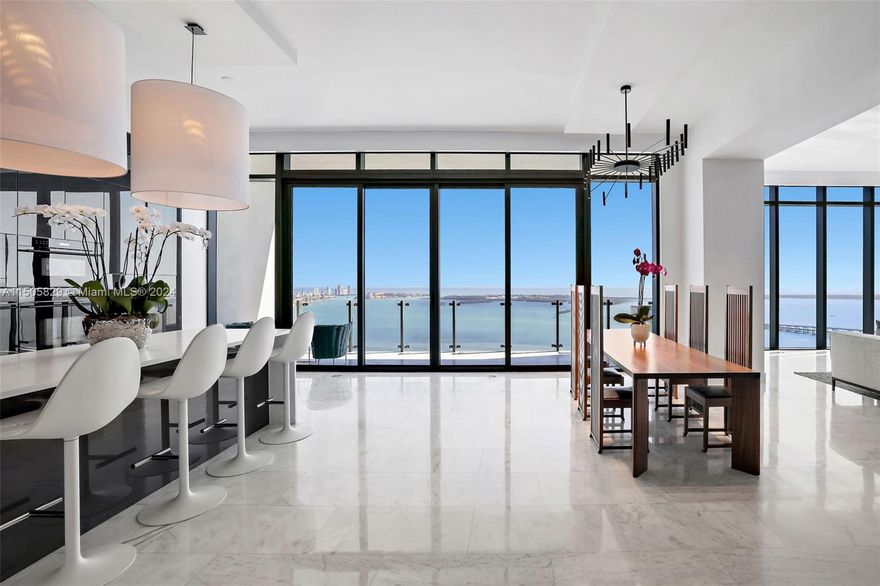 Experience unparalleled luxury in this bespoke lower penthouse, occupying half of the 49th floor with a customized floor plan. Soaring 12-foot ceilings frame unobstructed views of the bay, ocean, city, and the southern coastline. An expansive 600-square-foot terrace, complete with a summer kitchen, provides the perfect space for entertaining.

Furnished by Cassina + Paola Lenti; marble + custom wood flooring flow seamlessly throughout the residence, enhancing its timeless appeal. 

Echo Brickell is an exclusive, boutique building in the heart of Miami’s Financial District, offering world-class amenities, including a pool, two spas and state-of-the-art fitness center.

Offered fully furnished, complete with three parking spaces + one temperature-controlled storage unit.