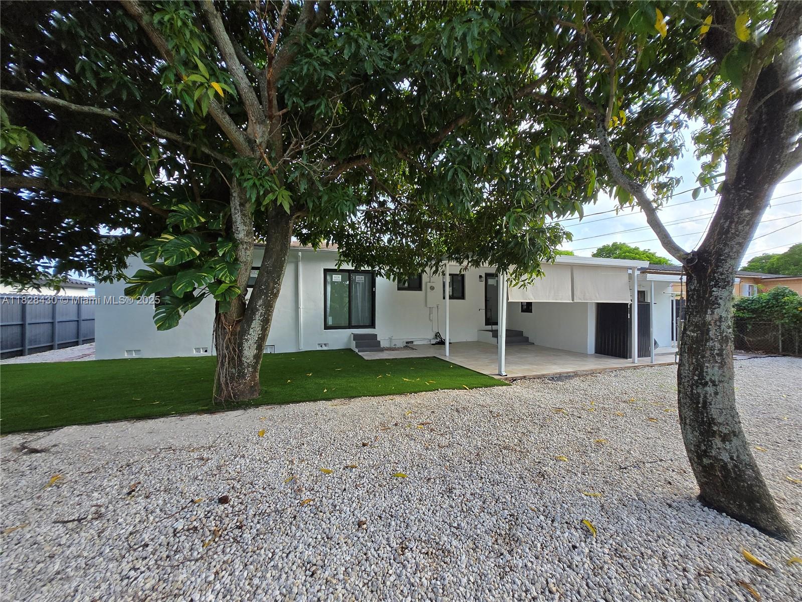 Welcome to this beautifully renovated 4-bedroom, 3-bathroom home located in the sought-after Palm Springs neighborhood of Hialeah. Featuring a fully permitted legal addition, this turnkey residence offers a brand-new roof, impact-resistant doors and windows, and modern finishes throughout.
The spacious layout is perfect for families, with upgraded bathrooms, contemporary kitchen details, and plenty of natural light. The private backyard is a true highlight—featuring premium K-9 artificial turf, perfect for pets and low-maintenance outdoor living.
Enjoy quick access to the Palmetto Expressway, making commuting a breeze. Don't miss this opportunity to own a fully updated home in a prime location with every detail thoughtfully designed for comfort and convenience.