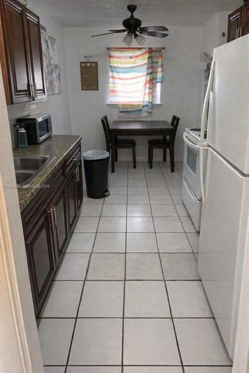 Photo of 1489 W 34th St, Riviera Beach, FL 33404 (MLS # A11948348)