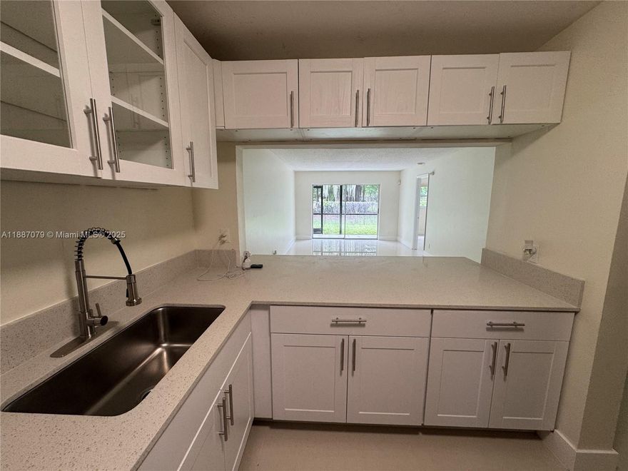 Upgraded 2 Bed 2 Bath condo with Open floor plan, stainless steel appliances, screen patio with golf - course views. Oversized bedrooms with generous closets and in-unit washer/dryer. Community amenities: 2 pools, tennis and basketball courts, clubhouse.