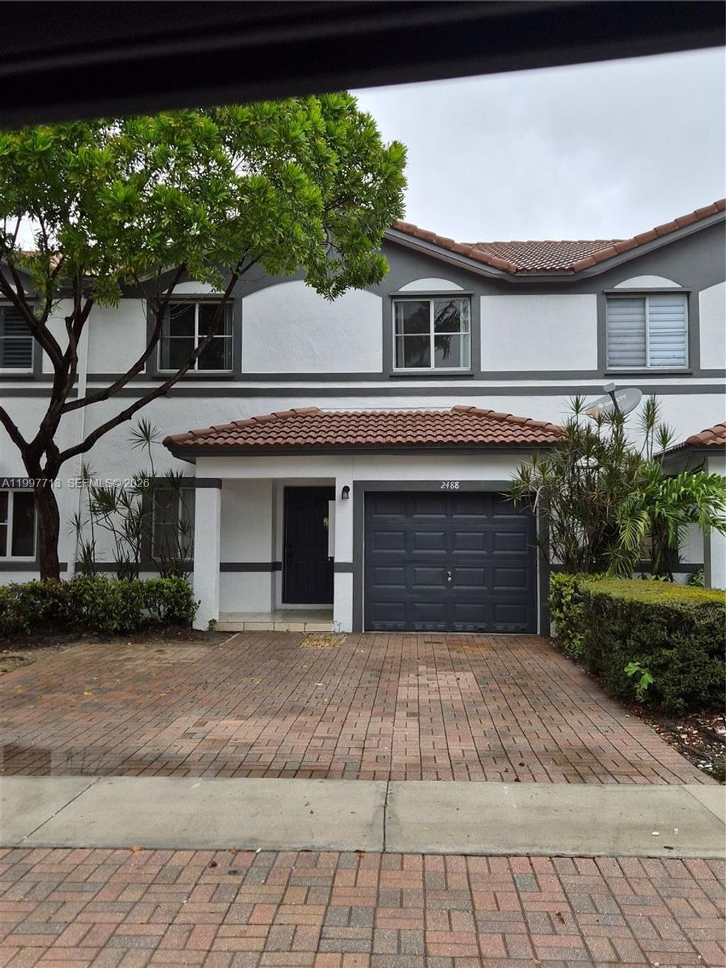 Photo of 2488 NW 99th Way, Sunrise, FL 33322 (MLS # A11997713)