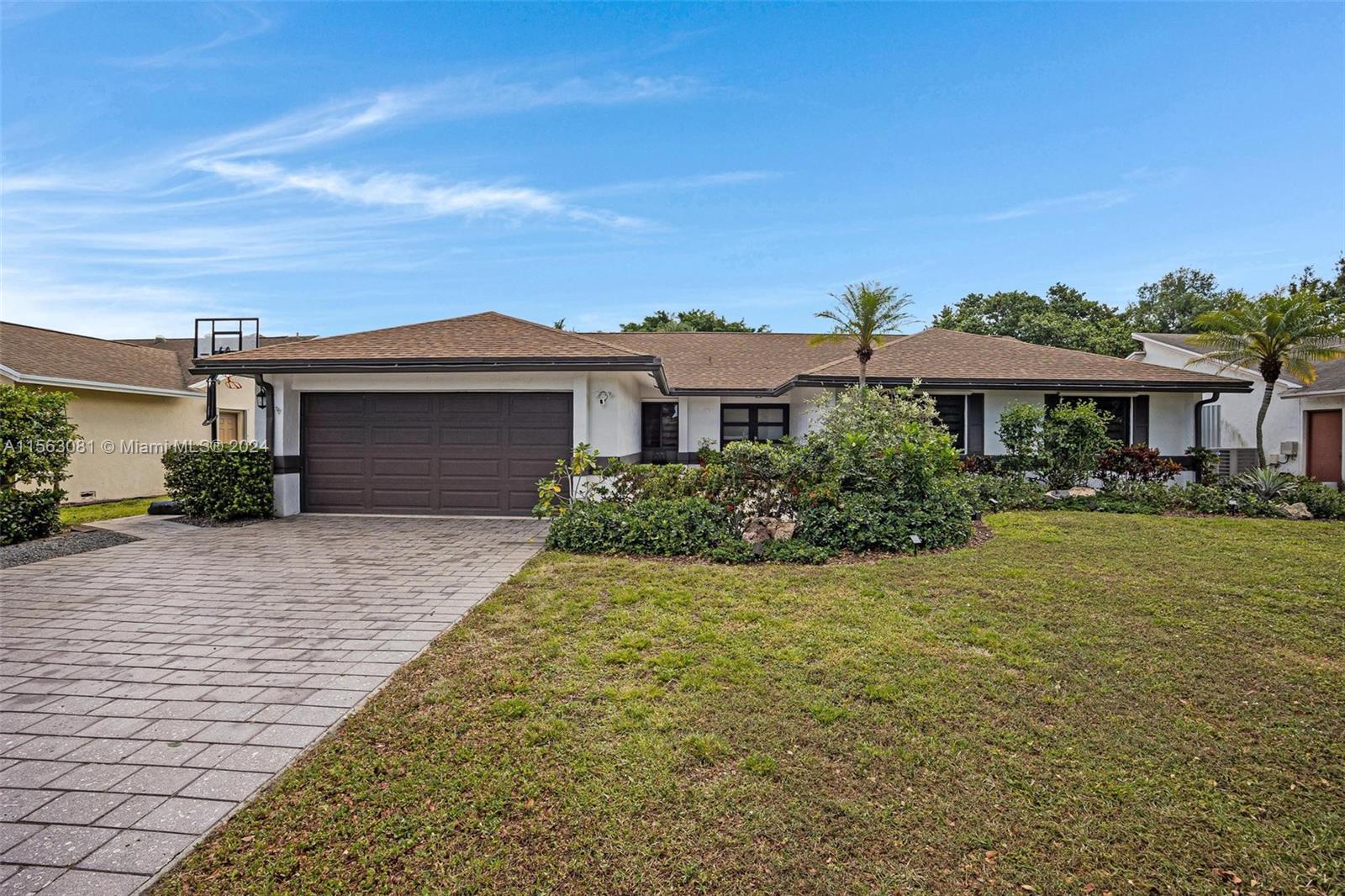 Davie~Rolling Hills Lake Estates~3BED/2BATH~Pool*1-story Home w/2Car Garage~NO HOA!~Modern decor*Sleek, Streamline Interior~Flexible floor-plan~Takes your breath away as soon as you walk through the front door!~Crisp presentation w/attention to detail from the cracked edge Travertine Decking & Walkways to the Resort-Style Backyard w/Resurfaced Oversized Pool recently converted to Salt System~Nestled in the Heart of Davie this home is a true Winner! More Upgrades include *Impact Windows & Doors throughout*New SS Appliances & Kitchen Cabinets,*New flooring,*Solid Interior Doors,*Recessed lighting,*Window treatments,*Outdoor Gazebo w/Built in Barbecue.~Top schools & No HOA ensure great resale in the future making this a solid investment.~Primo location!Close to NSU,All Colleges & HCA Hospital