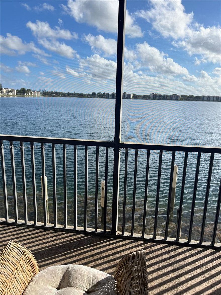 Spacious 2/2, 1250 sqft, split bedroom layout with in-unit washer/dryer. Enjoy stunning lake views from the beautifully updated kitchen, complete with granite countertops and ss appliances. This resort- style community offers fantastic amenities, including 3 heated pools, tennis/pickle ball courts, poolside cafe open daily, gym and library. Ideally located 5 miles from the beach and, close to shopping and dining options.