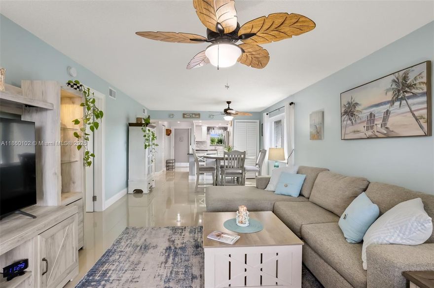 Gorgeous corner unit with stunning water views in strong condo building with reserves and completed SARS compliance. Pristine upgraded open floor plan, this rare beauty comes with a full sized washer & dryer and has it all!  New granite countertops & flooring with impact windows throughout. All kitchen appliances just 2 yrs old. Purchase with comfort knowing this building just completed their 50 yr recertification this year w/roofs just 5 years old and re-thatched tiki huts at its resort style pool. NO ASSESSMENTS Enjoy a google nest thermostat and doorbell cameras w/free high speed internet & cable package. Close to it all, including major airports, shopping and highways. Take advantage of this updated and well run building and move in with no worries.  A MUST SEE BEAUTY!